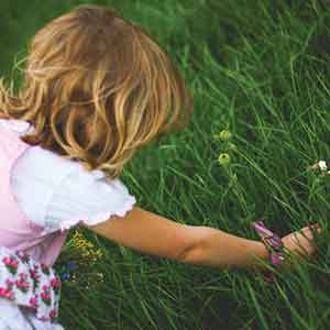 Girl Picking Spring Flowers